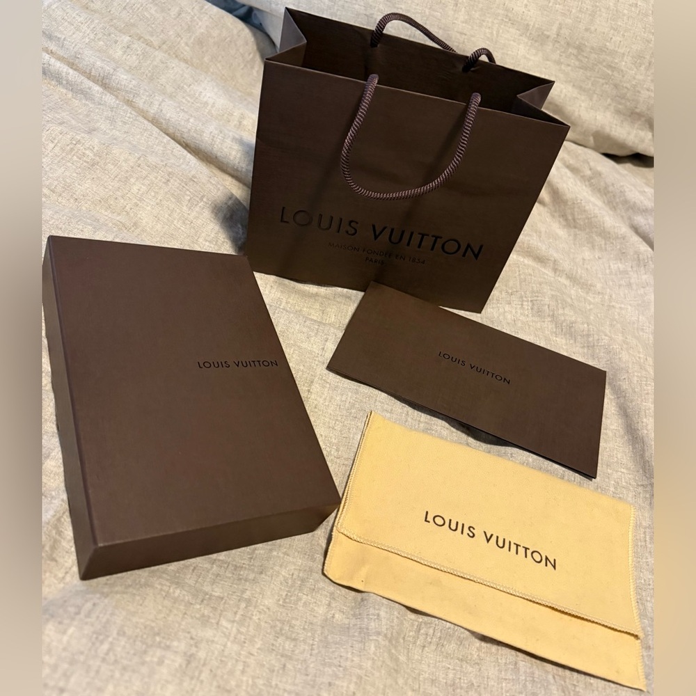 Authentic Louis Vuitton box (empty) with extras